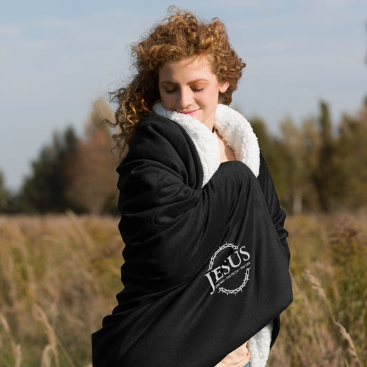 Comfortable Blanket JESUS the Way, the Truth, The Life design in a cozy outdoor setting.