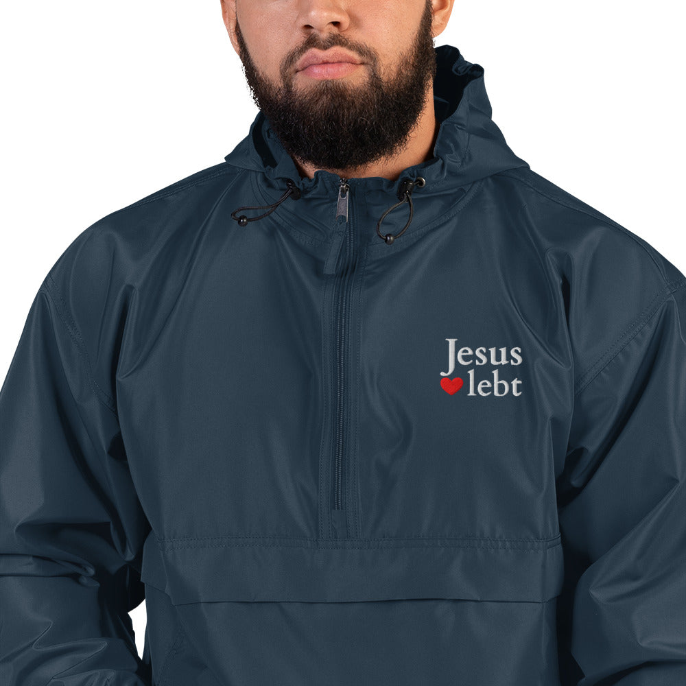 Jesus lebt - Bestickte, verstaubare Champion-Jacke - dunkles Design - DE faith design by The Light of Life